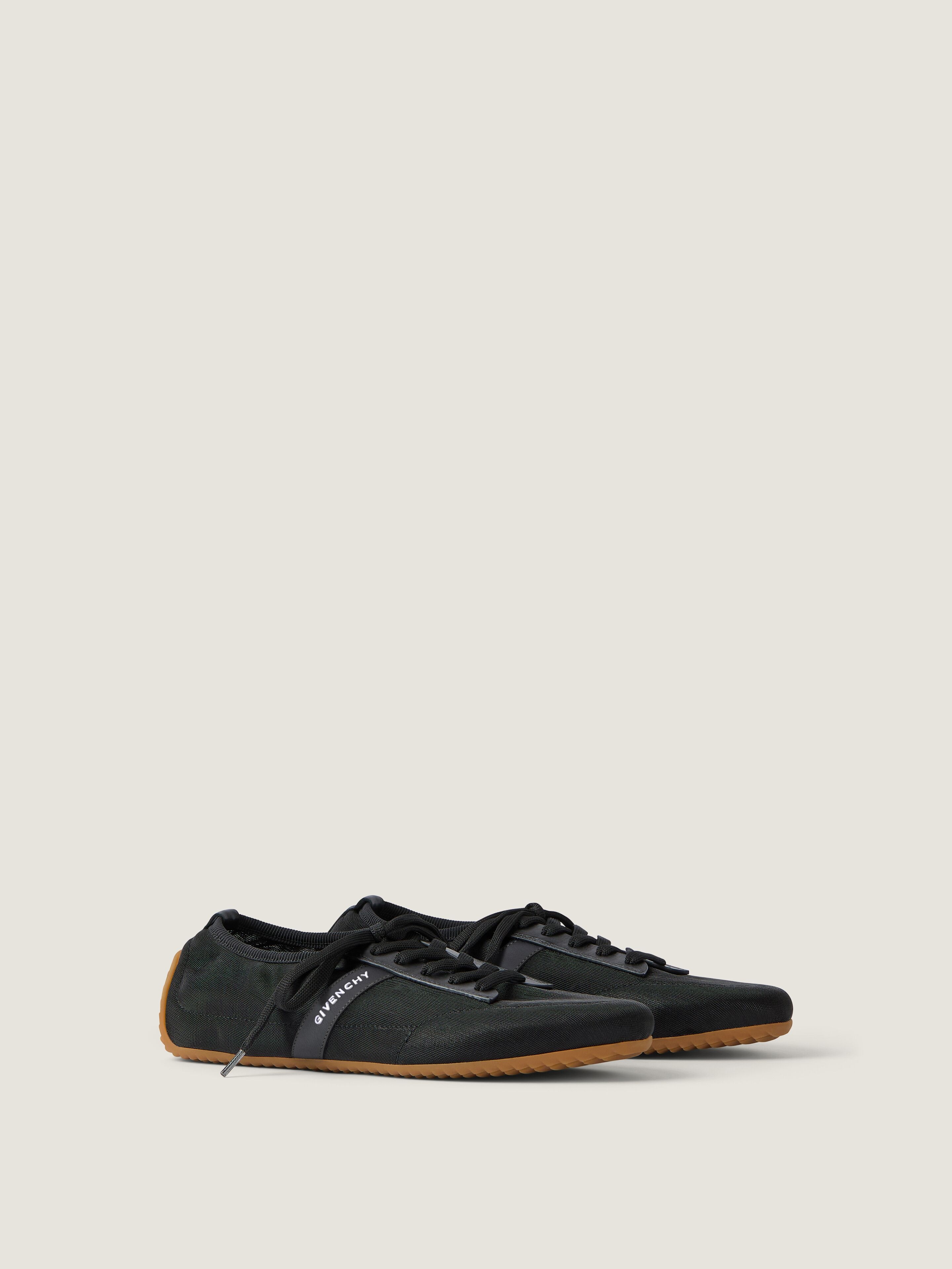 Slim sneakers in transparent mesh and leather